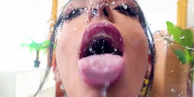 Splendid brunette Katrina spits and licks her saliva from a glass