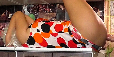 Cock-hungry MILF is being ass-fucked in the kitchen