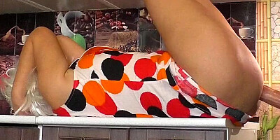 Cock-hungry MILF is being ass-fucked in the kitchen