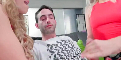 Two slim blondes are taking turns on the cock of their mutual buddy