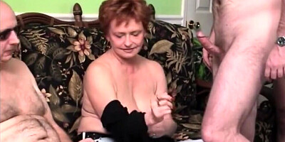 Short-haired white MILF enjoys sucking that big black cock