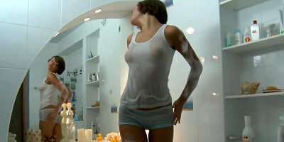 Classy girl looks lovely playing with pussy in the bathroom