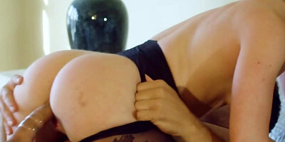 Slim MILF in ripped pantyhose relaxes in bedroom with Latin guy