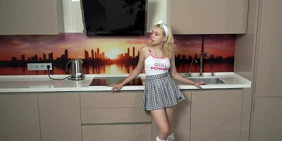 Blonde schoolgirl gets horny and masturbates on the floor