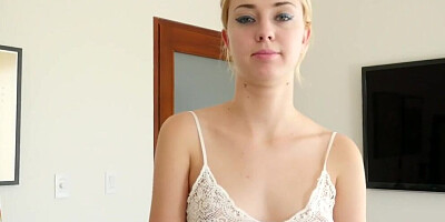 Haley Reed stares at the camera while having Tony Profane's cock in mouth