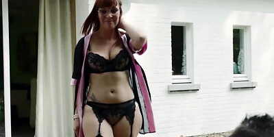 Nerdy redhead MILF Angelique is being fucked in the woods