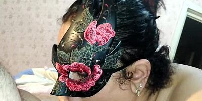 Fat masked woman blows her man and licks his balls while giving head