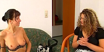 Two horny lesbians are making out and fingering in classy video