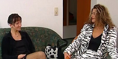 Two horny lesbians are making out and fingering in classy video