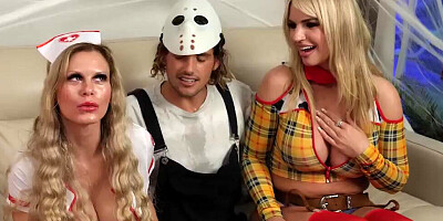 Two busty MILFs and one lucky man are having Halloween 3way