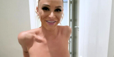 Blonde is filmed POV style while sucking off a big dick in a bathroom