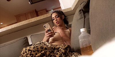 Sweet brunette girl is flashing her lovely boobs for the camera