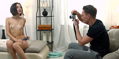 Anorexic babe is on the sofa, getting some pictures taken