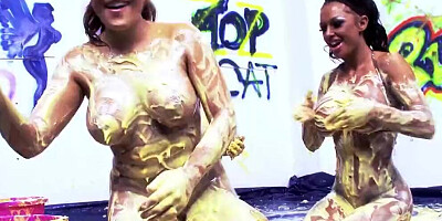 Massive boobs lesbians pour egg yolk all over themselves for a slippery and sexy pussy rub