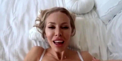 Nicole Aniston flirts with the camera while sucking some hard cock