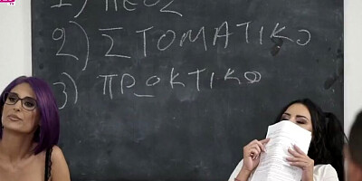 Two babes are being dicked down by four guys in the classroom