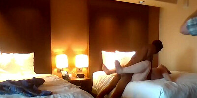 Naughty cougar spreads her legs while a black stud fucks her