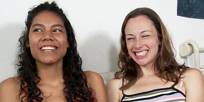 Tanned curly babe gets her pussy fingered by white brunette
