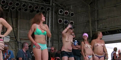 Slutty MILFs are dancing naked on stage at Iowa Biker Rally