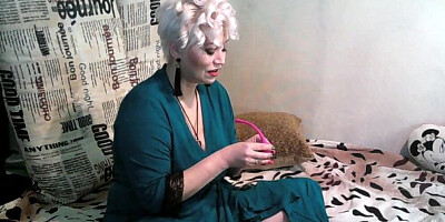 Russian mature rubs her muff in front of the camera