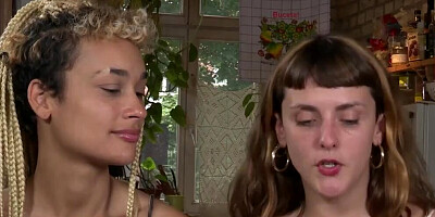 Two kinky lesbians are engaging in a hot action on the table