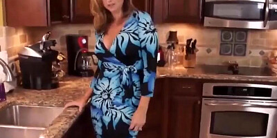 Slutty blonde MILF is spanked and fucked in the kitchen