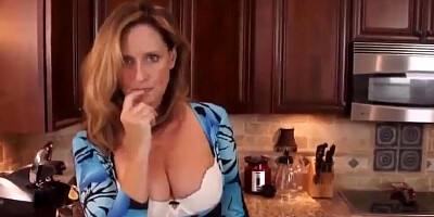 Slutty blonde MILF is spanked and fucked in the kitchen