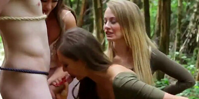 The cock of a tied-up guy was used by three naughty babes for sexual pleasure