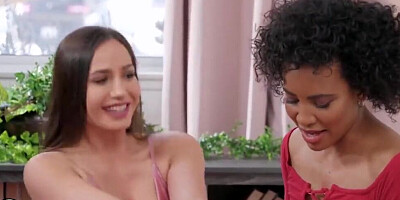 Curly-haired ebony gal is having lesbian sex with her white lady friend