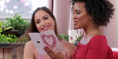 Curly-haired ebony gal is having lesbian sex with her white lady friend