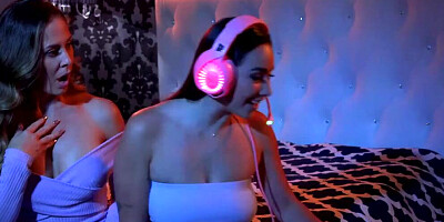 MILF and her stepdaughter are making out in the bedroom