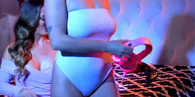 MILF and her stepdaughter are making out in the bedroom