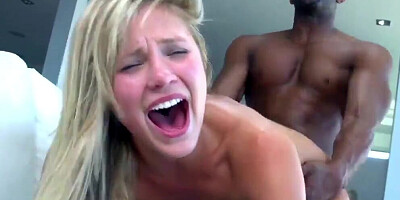 Blonde MILF screams with pleasure while black man fucks her