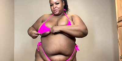 Curvy black woman gets naked and plays with a sex toy