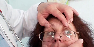 Naughty doctor touches that mature woman while giving her an exam