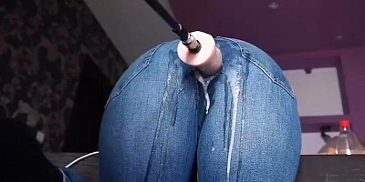 Fucking machine penetrates webcam girl thorough a hole on her jeans