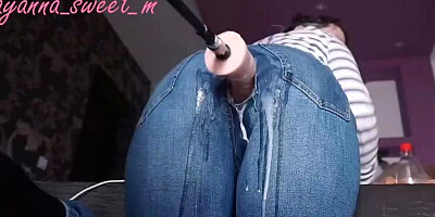 Fucking machine penetrates webcam girl thorough a hole on her jeans