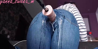 Fucking machine penetrates webcam girl thorough a hole on her jeans