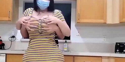 Curvy brunette MILF is spanked and fucked in the kitchen