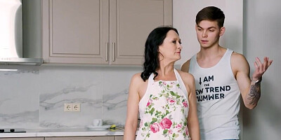 Very fit lad having sex with a busty brunette cougar