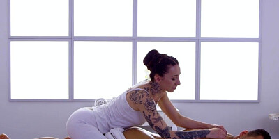 Inked babe gives her man a couple of orgasms after massage