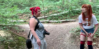 Ginger hottie is having erotic photoshoot in the woods