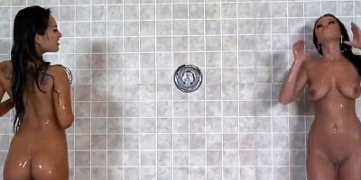 Gorgeous lesbian Asian cutie licking and dildoing her arousingly slutty busty friend in the showers