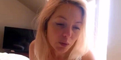 Amateur blonde MILF is filmed by stepson while riding his cock