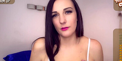 Ravishing brunette in sexy white lingerie slobbers on a dildo