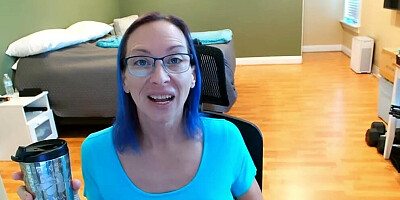 Busty mature flashes her boobs in front of the cam