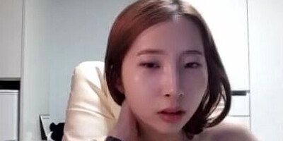 Petite Asian chick is playing with her nice tits on webcam