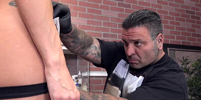 Vanessa Skye deepthroats a cock after getting tattooed