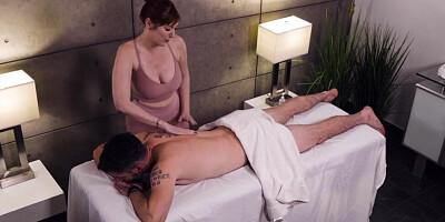One lady is giving him a sensual massage, while another is milking his big cock