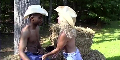 Busty blonde mom is having interracial sex in the open air